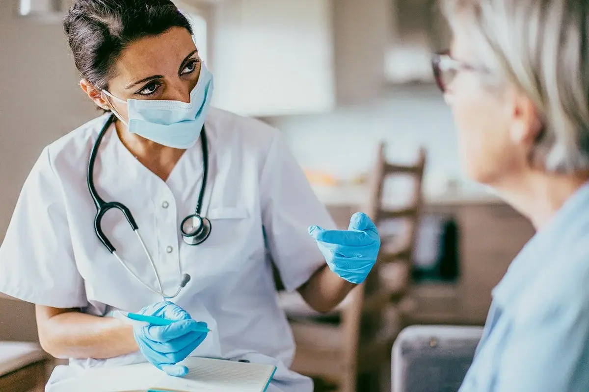 nurse and patient at home